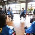 Japan Prime Minister speaks with workers.